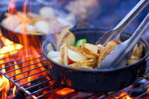 Gear for cooking over a campfire